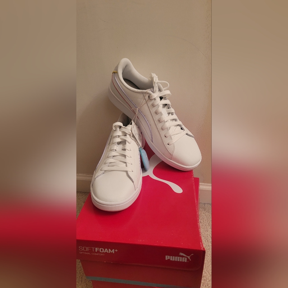 Brand new, white Puma sneakers